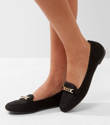 black flat shoes with ankle strap and laces