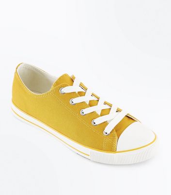 mustard yellow canvas shoes
