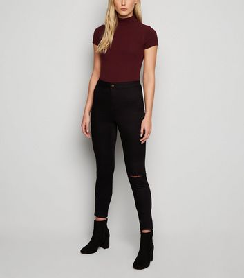 black high waisted jeans ripped knee