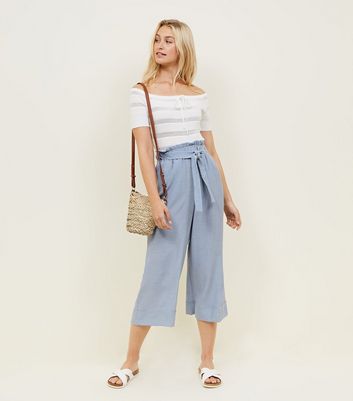 pale blue cropped trousers