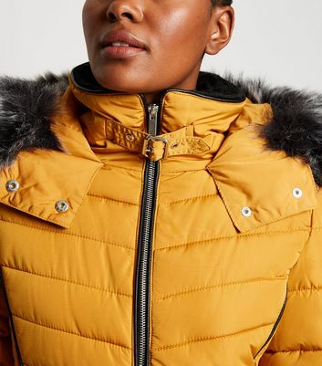 mustard faux fur trim hooded puffer coat