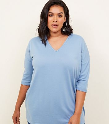 pale blue v neck jumper