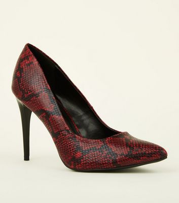 red pointed court shoes