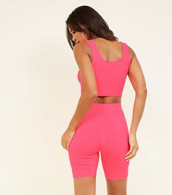 bright pink cycling shorts