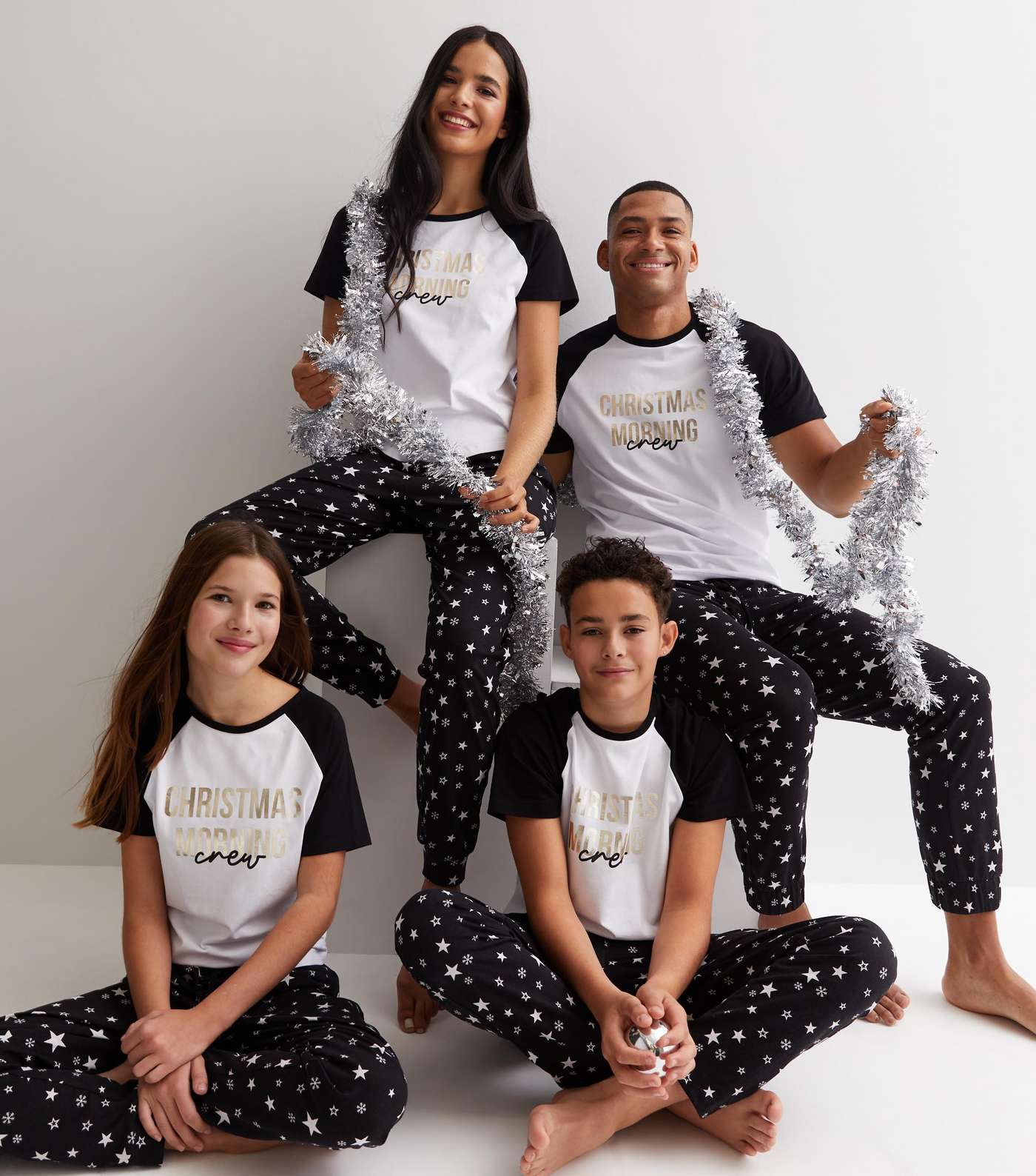 Boys Black Family Christmas Jogger Pyjama Set with Star Print Image 2
