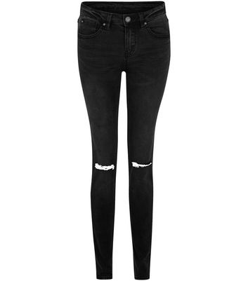 black holey skinny jeans