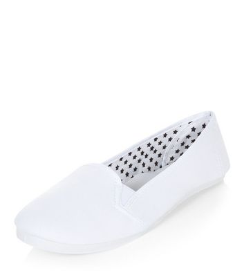 white slip on plimsolls