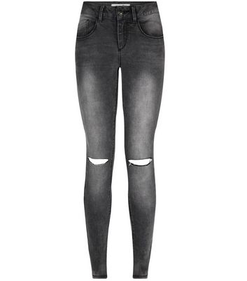 grey ripped knee skinny jeans