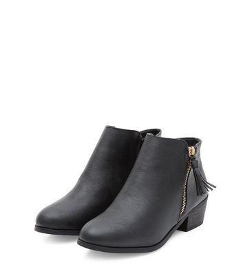 black ankle boots with tassels