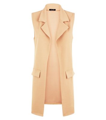 long sleeveless duster jacket