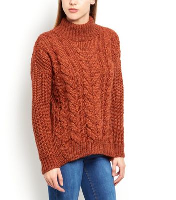 cable knit roll neck jumper womens