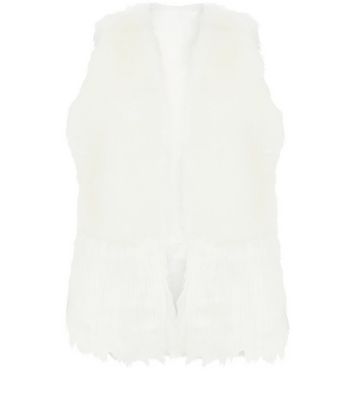 white faux fur gilet