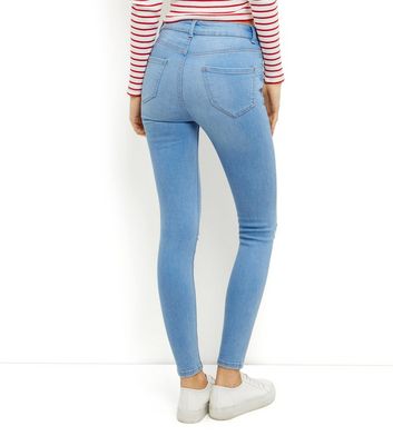 skinny light blue ripped jeans