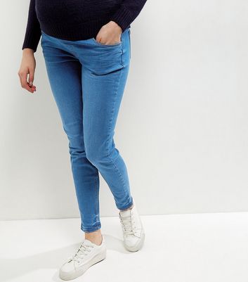 under bump skinny jeans