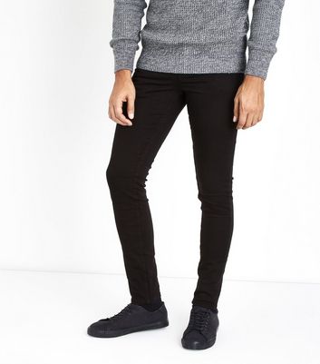 black skinny jeans on men