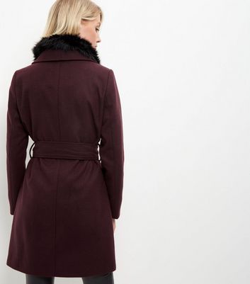 maroon coat with fur collar