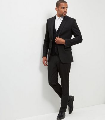 black suit black waistcoat