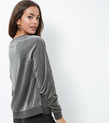 grey velour sweatshirt