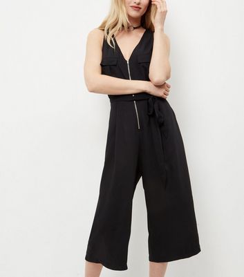 black jumpsuit with zip at front