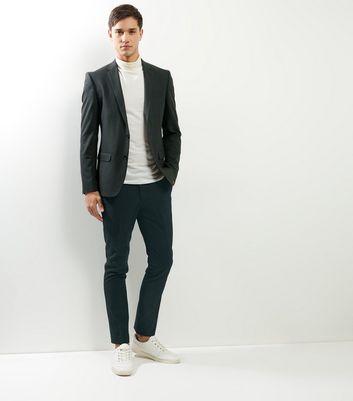 green suit trousers
