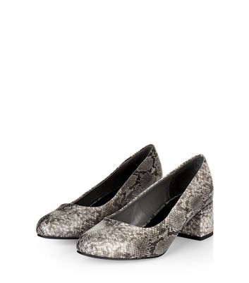 snakeskin court shoes
