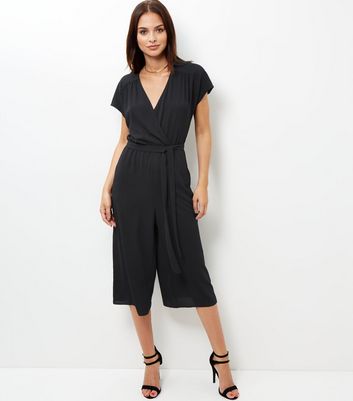 black jumpsuit nude heels