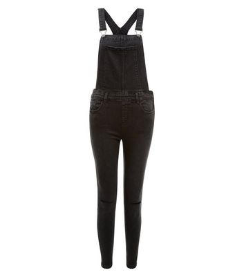 black ripped dungarees