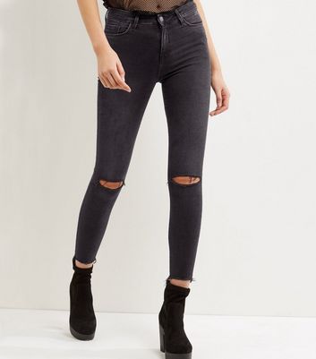 frayed black skinny jeans
