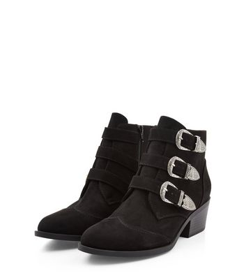 black booties with silver buckles
