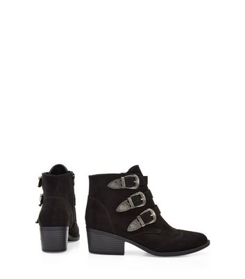 black ankle boots with silver buckles