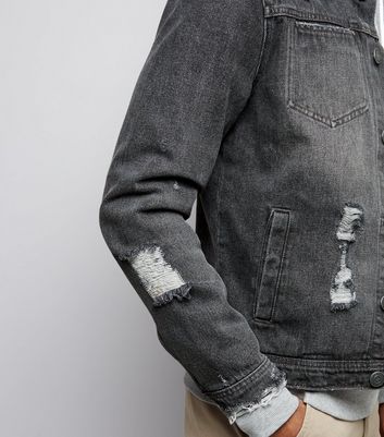grey ripped denim jacket