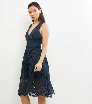 bodycon lace bodice peplum hem midi dress in green
