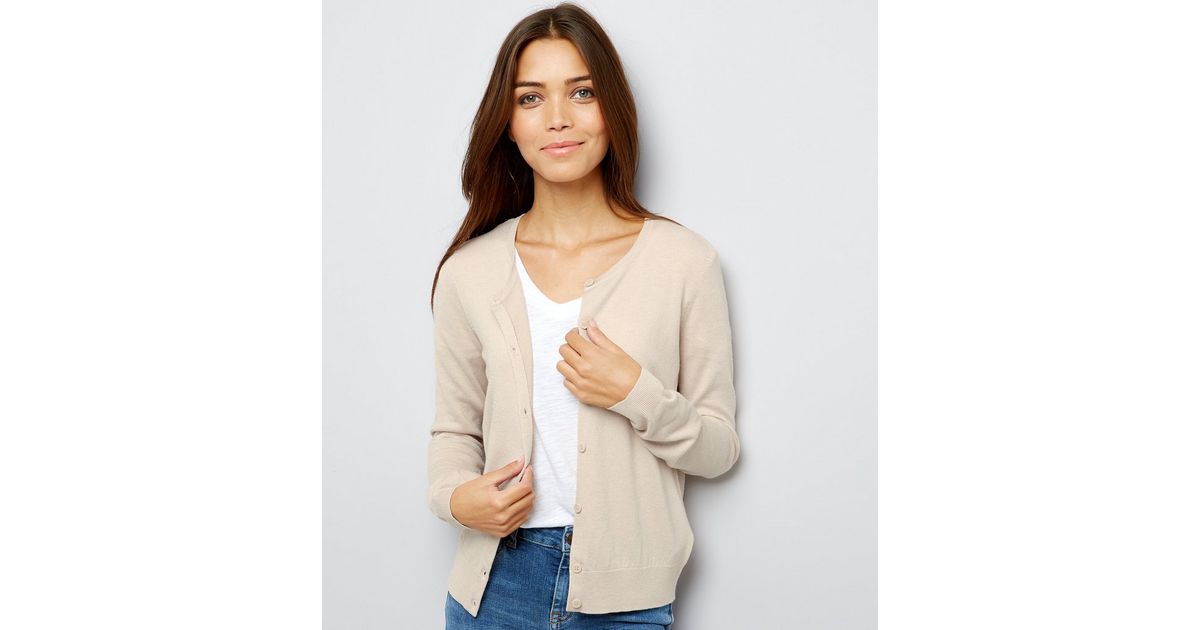 cream crew neck outfit