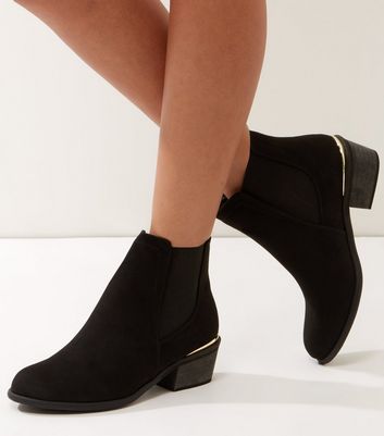 metal trim ankle boots