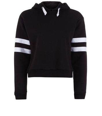 black hoodie with white stripes on sleeves