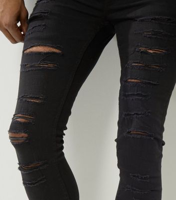 black super skinny ripped jeans