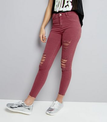 dark red ripped jeans
