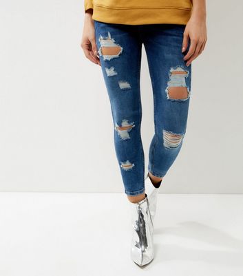 petite ripped skinny jeans