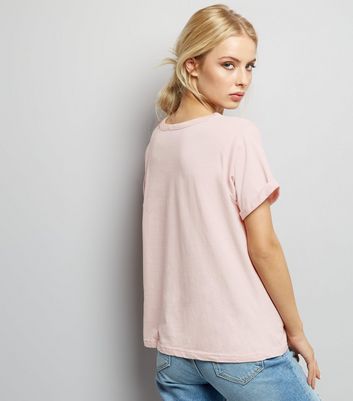 Pink ripped t shirt best sale