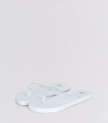 white glitter flip flops