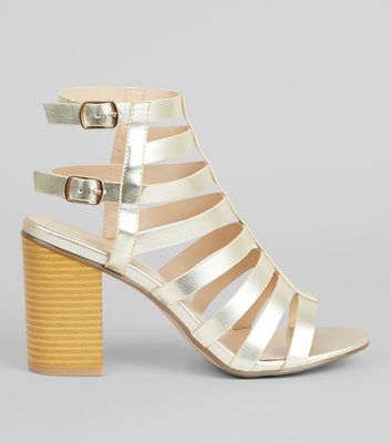 gold gladiator block heels
