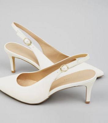white pointed slingbacks