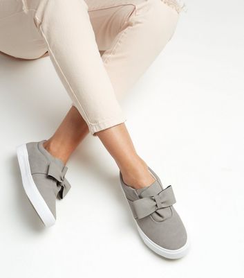 bow front slip on trainers