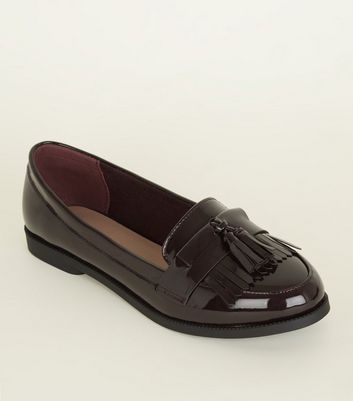 patent fringe loafers