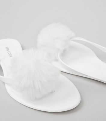 white pom pom sandals