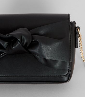 black bow clutch bag