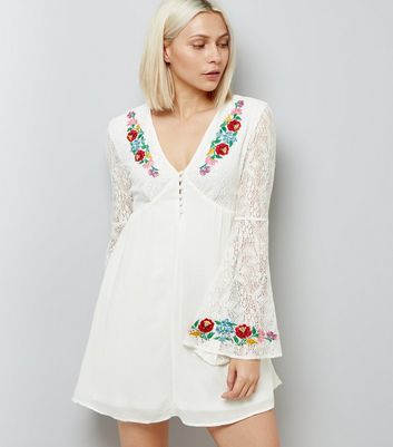 women's white embroidered dress