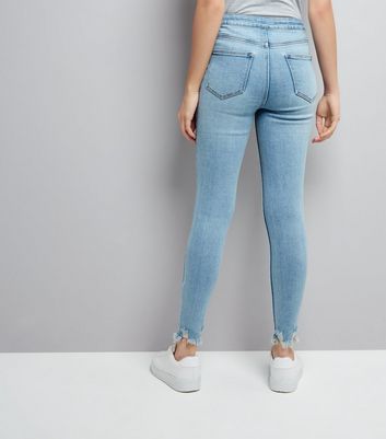 blue jeans with frayed hem