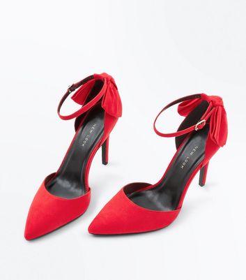 red heels with bow on back