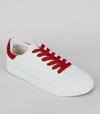 white trainers red sole